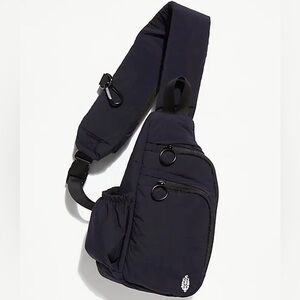 Black Sling Crossbody Bag with Ring Zippers - FREE PEOPLE